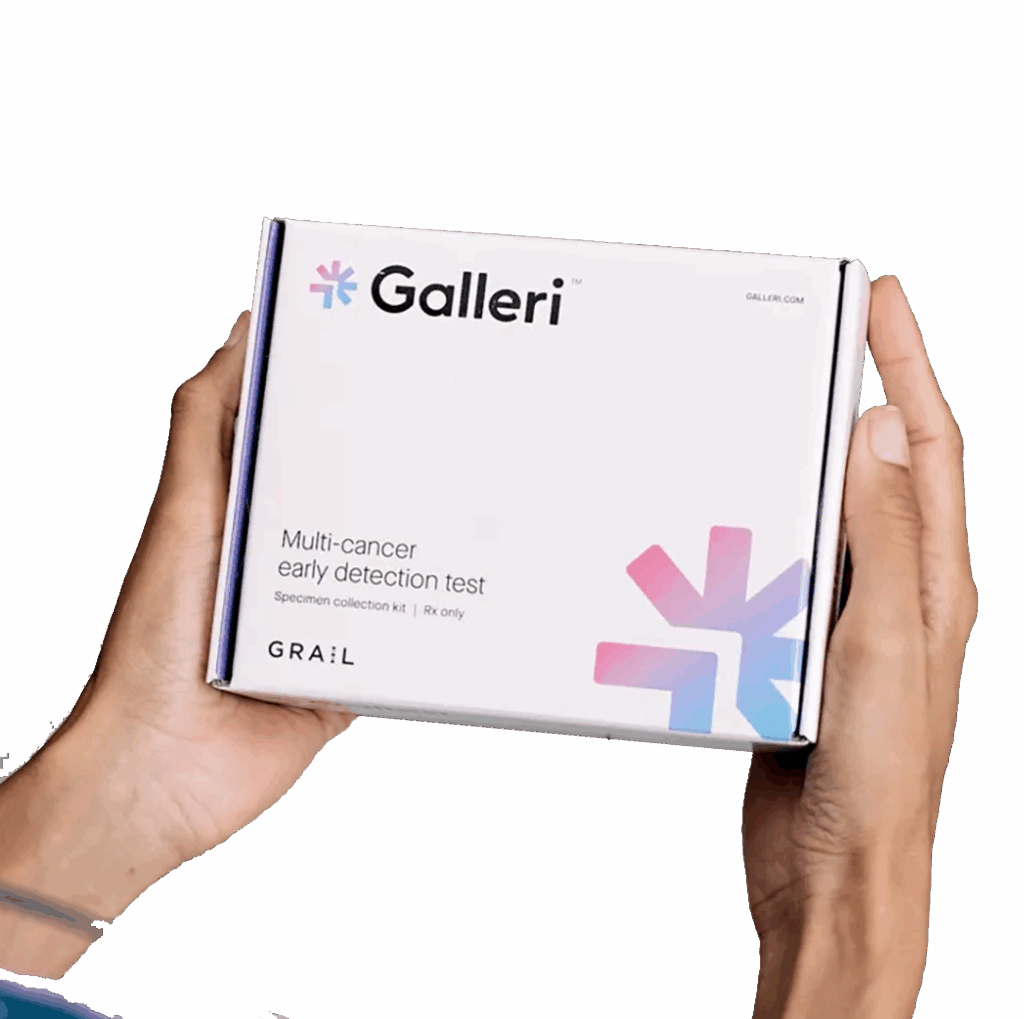 Hands holding a Galleri multi-cancer early detection test specimen collection kit box by GRAIL.